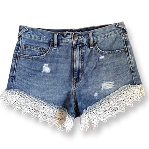 Free People denim shorts with crochet trim